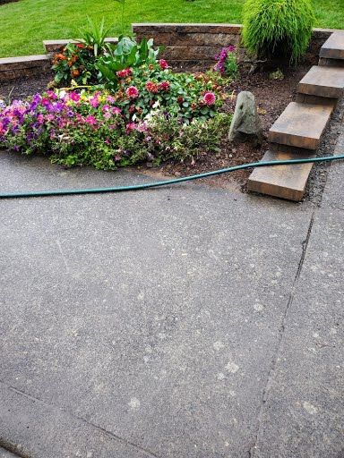 Planter retaining wall with flower beds and stone edging, Battle Ground WA