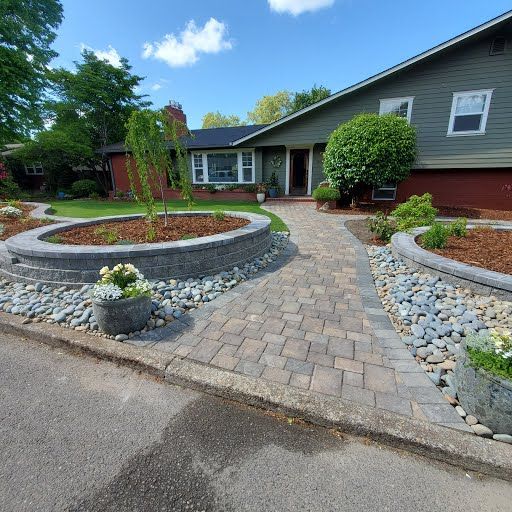 Paver driveway with raised retaining planters, residential hardscape Clark County