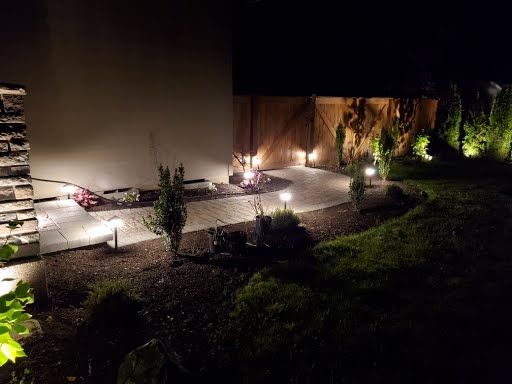 Flagstone patio with step lighting at dusk, Ridgefield WA