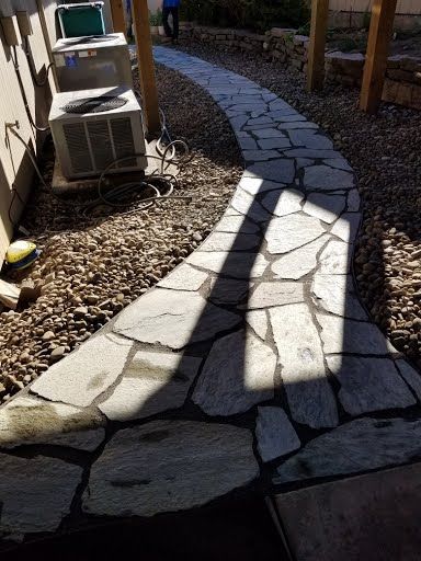 Flagstone path with decorative rock border and plantings, Ridgefield WA